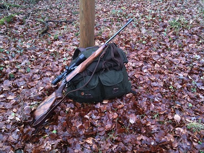 hunting backpack and rifle