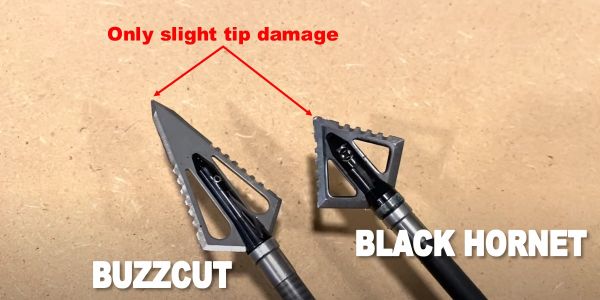 tips of magnus buzzcut and black hornet broadheads after being shot 5 times into steel plate