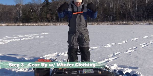man wearing ice fishing clothing