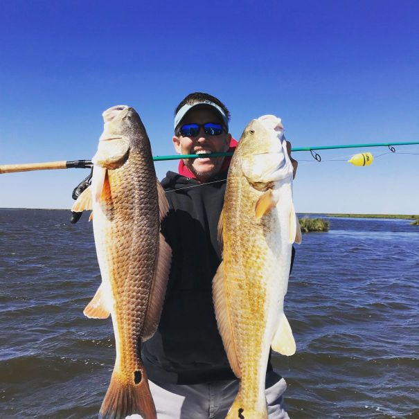 ranch fairy troy fowler holding redfish