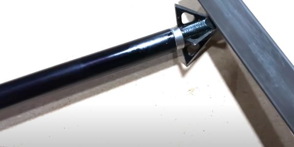 sharpening a tooth of the arrow broadhead