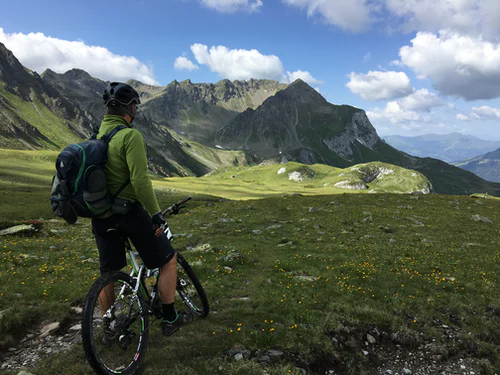 man with mountain bike in the mountains