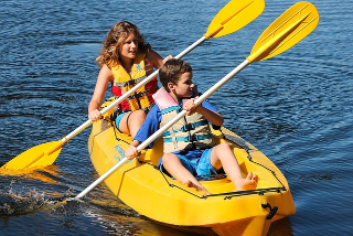 woman and kid kayaking