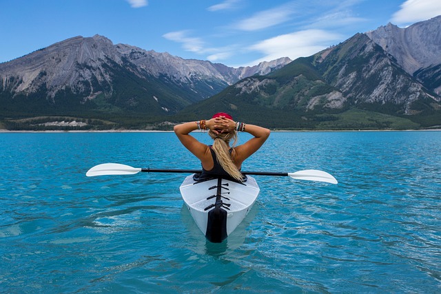 woman in collapsible kayak