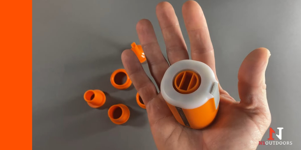 flextail tiny pump 2x in palm of hand