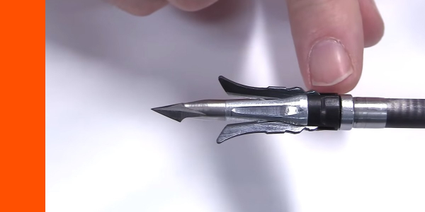 Here’s a good look of the head. Man, there’s a lot of cool stuff about this broadhead. First of all, the materials, the blades are a 440C stainless steel and they’re 0.035" thick so pretty decent thickness to them. And then the tip is a hardened steel tip. This is their Pro Series tip. They make a few different tips for their mechanicals. This is by far my favorite because it’s really sharp like a cut-on-contact tip but it’s also a chiseled tip which I mean, it penetrates through really tough mediums very well. I’ve seen that thing buried really deeply into concrete in previous tests.