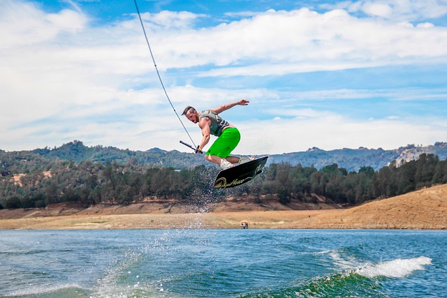 wakeboarder in green shorts