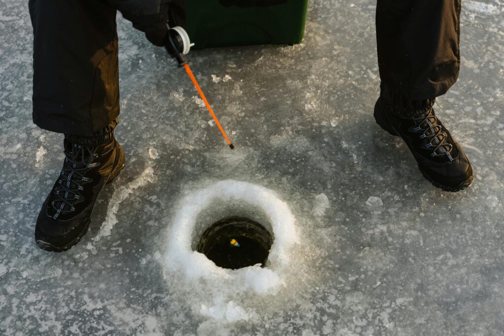 fishing in a hole in the ice