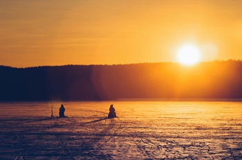icefishing at sunrise