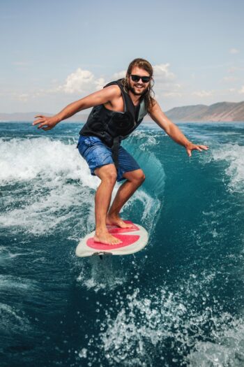 man wakesurfing