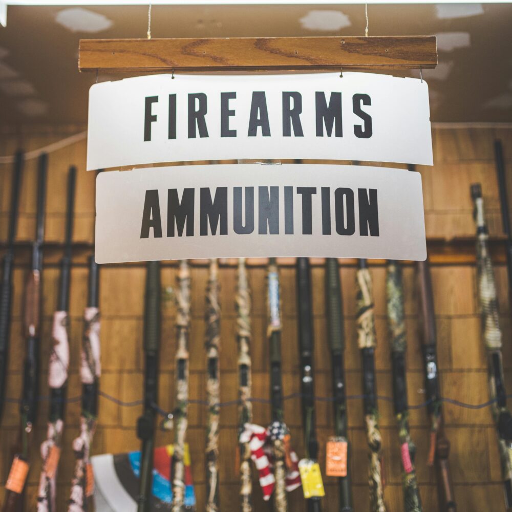 gun store sign for firearms and ammo