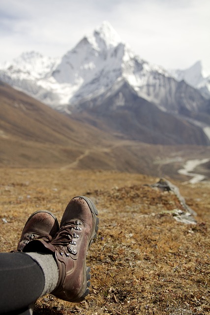 hiking boots with mountain background