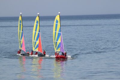 people on sailboats