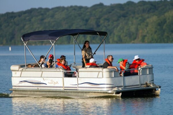 people on pontoon boat