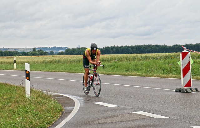 man riding triathlon bike