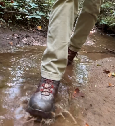 muck boots alpha pursuit walking in the creek water