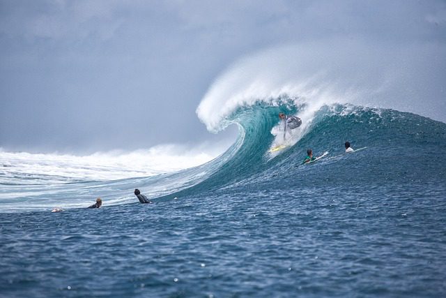 surfing giant wave