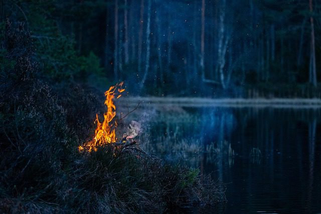 campfire near water