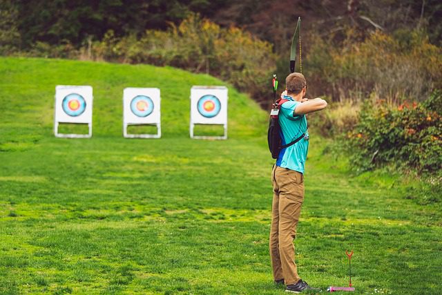 a male youth on archery range