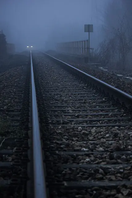 railroad and train at night
