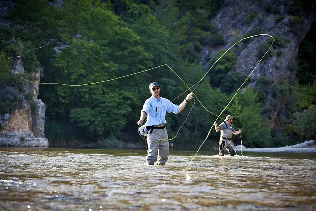 two men casting fly fishing