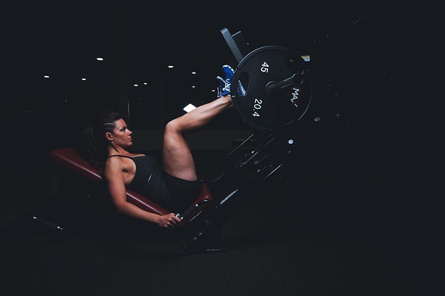 woman on leg press machine