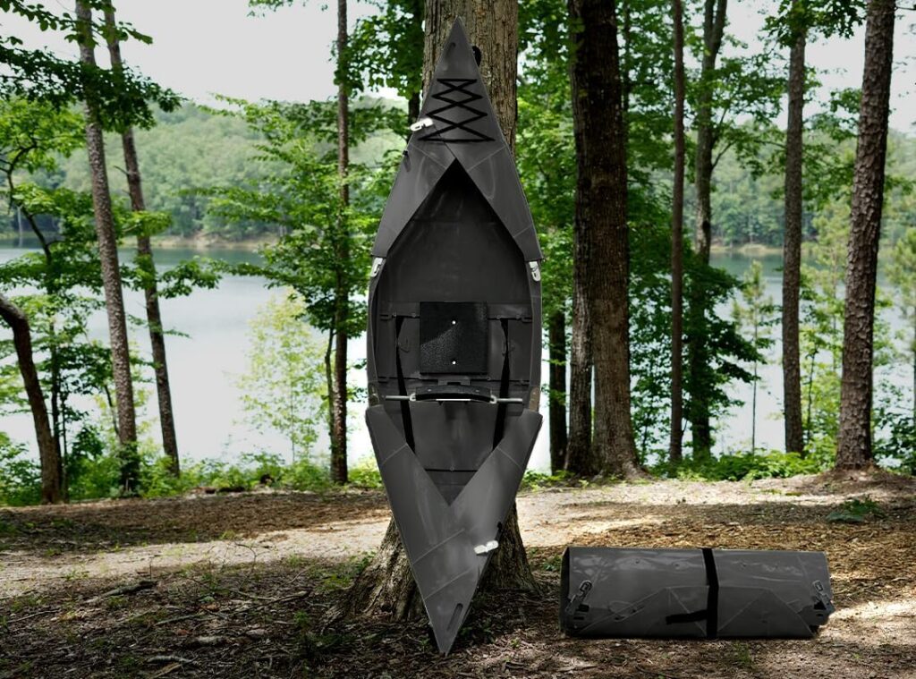 foldable kayak against tree