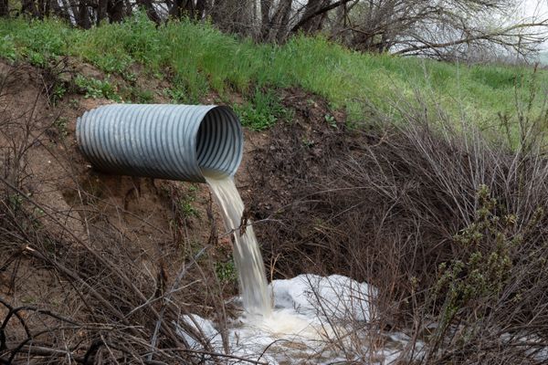 small culvert draining water on rural land